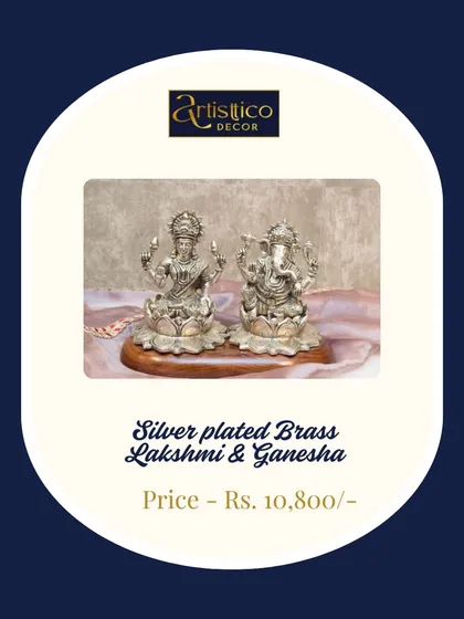 This set of silver-plated brass Lakshmi and Ganesha idols is a perfect gift for a new beginning. They sit on a wooden base, making them a beautiful and auspicious addition to a home temple.