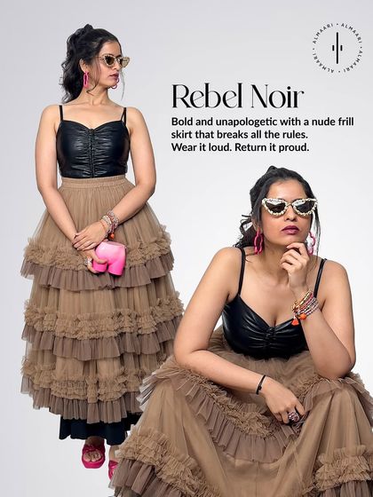 Rebel Noir. Here I've paired the same faux leather bustier from the gown with a bold, tiered nude frill skirt. It's about breaking the rules and wearing it loud.