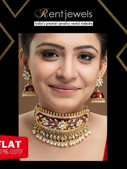 This hand-worked Jadau Kundan choker features rich red enamel and pearl details. It's a perfect statement piece to pair with a red or cream-colored bridal lehenga.