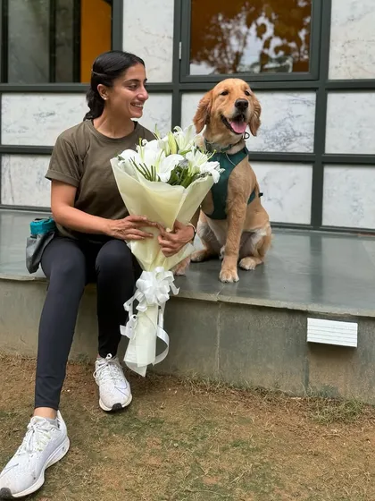 Another beautiful moment with a graduate and a thank you bouquet.