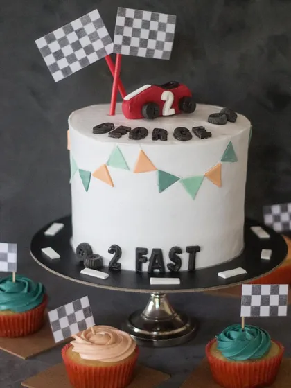 I love a fun theme! This "2 Fast" racing cake and matching cupcakes were for a little boy's second birthday. I can create custom designs for any party, from kids' superhero themes to more grown-up celebrations.