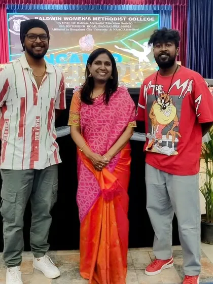 We are proud to be recognized as experts in the dance community. Here we are with a fellow judge at the 'INCANTO 2K25' intercollegiate group dance competition.