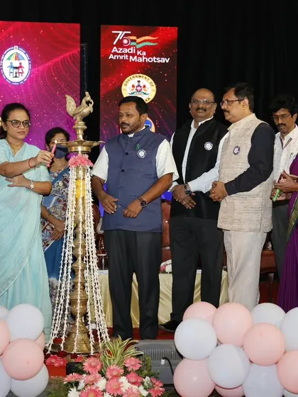 We are honored to manage formal corporate and social responsibility events. This moment captures the inaugural lamp lighting ceremony at the International Adoption Month seminar, where we handled the stage setup, floral arrangements, and overall event coordination.