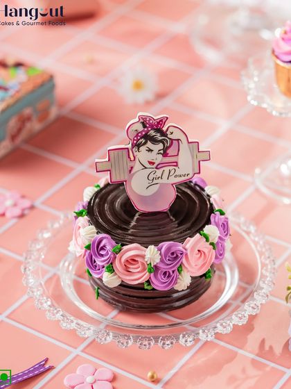 This Women's Day, order our rich and decadent Dutch Truffle bento cake. It's decorated with floral piping and a "Girl Power" topper to celebrate female strength.
