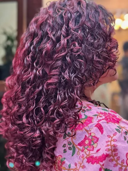 This berry-toned red has hints of pink and purple, creating a unique and eye-catching look.