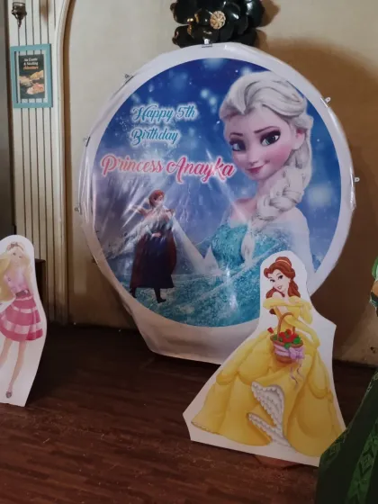 The beginning of a Frozen and Princess theme decoration. This is the backdrop and cutouts before the balloons are added. Balloons abhi baaki hai mere dost!