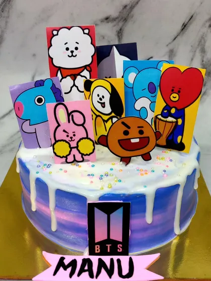 I purple you! 💜 A must-have cake for the BTS army, featuring the BT21 characters and the iconic BTS logo.