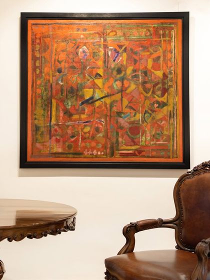 Achutan Kudallur's 'Untitled (Red)' from 1990, a vivid interplay of vermilion and ochre, is displayed here, demonstrating how his abstract works can anchor a space with energy.