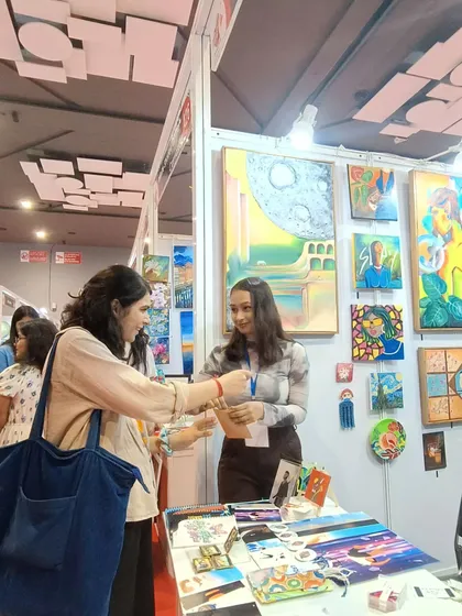 Connecting with people over art is my greatest passion. At 'The Haat of Art' exhibition, I had the chance to explain the stories behind my paintings and sell some of my handcrafted bookmarks and magnets to an appreciative visitor.