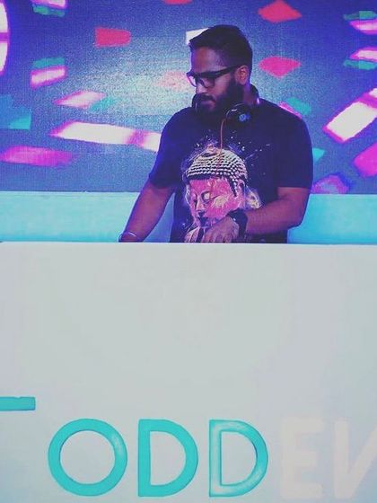 A shot of me performing at an Odd/Even event. The stage setup and visuals are a huge part of creating the right atmosphere for a memorable night.