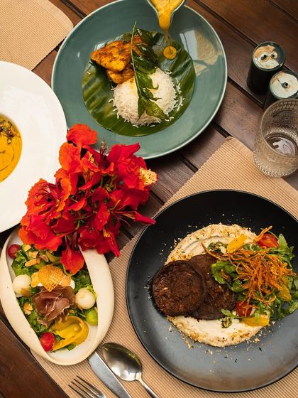 A table laden with our best dishes, from grilled meats to fresh salads, a true feast for the senses.