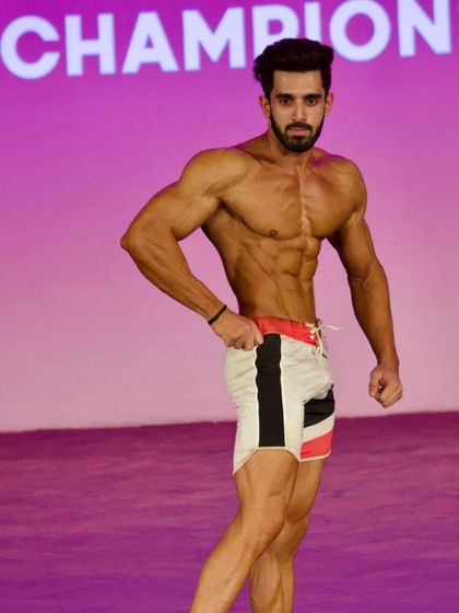 Side pose, showing his great lines.