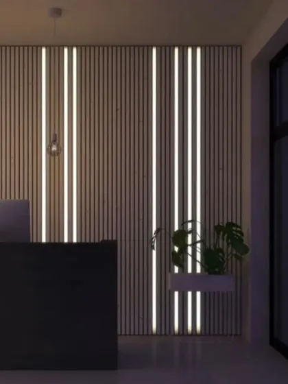 A full-wall installation of vertical slats with integrated LED strips, creating a dramatic and futuristic feature wall.