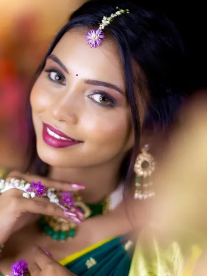 The Haldi ceremony is all about a happy, natural glow. For this look, I used a fresh, dewy makeup style with a pop of color on the lips to match the vibrant and joyful atmosphere. The goal is to look effortlessly beautiful and ready for all the fun.