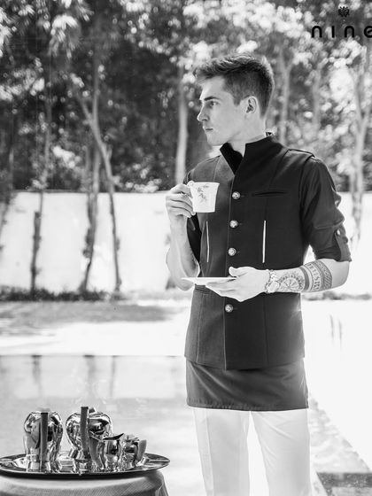 A full-length view of the "Metal Bling" kurta set. The clean lines and asymmetric cut make it a stylish and comfortable choice for any modern festive occasion.