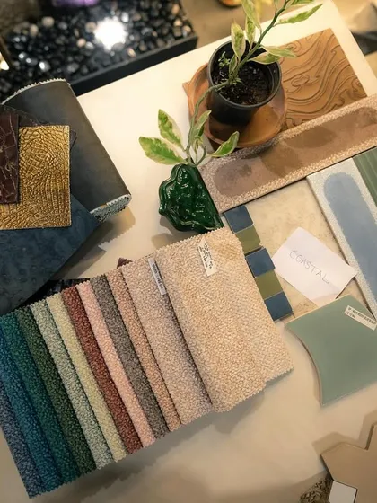 My moodboard approach in action. I use this collaborative process to bring a client's vision to life, laying out material samples, color swatches, and textures to ensure the final design is perfectly tailored to their style.