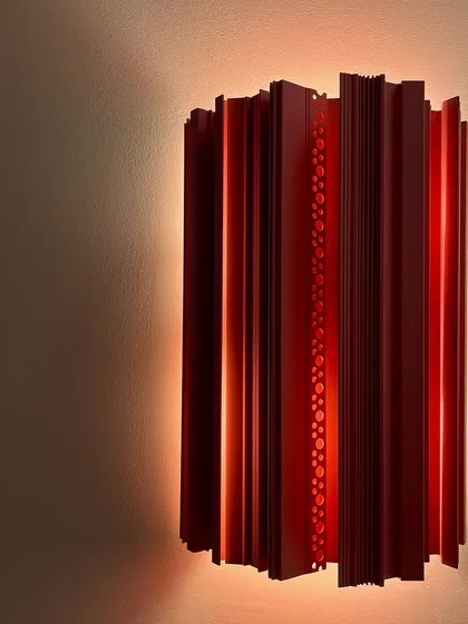A sculptural wall sconce by Delta Light, inspired by leftover aluminum profiles. We appreciate design that finds beauty and purpose in industrial materials, transforming waste into an object of art.