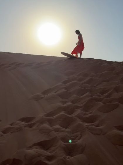 Sandboarding in the desert. Fitness gives you the energy and ability to say yes to adventures like this.