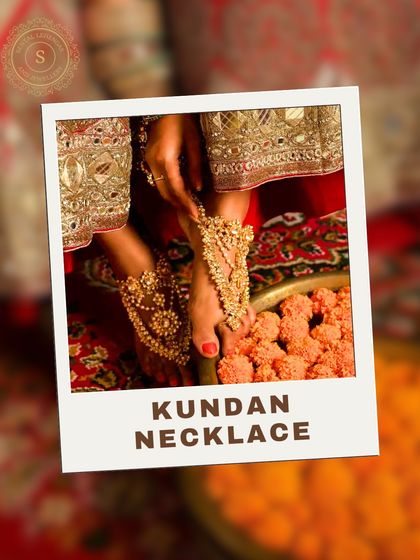 This image focuses on our beautiful Kundan hathphool, a hand harness that adorns both the wrist and fingers. It's an essential part of a complete bridal jewellery set.