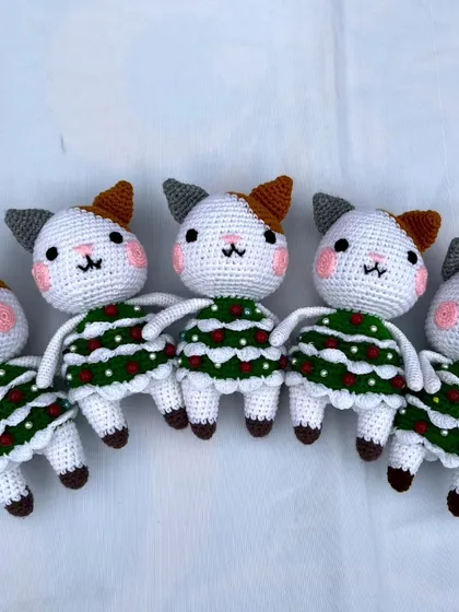These cute little cats are dressed up in their Christmas tree dresses. I love making special items for the holidays.