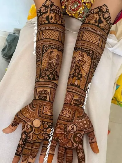 Here is another beautiful take on the varmala ceremony. The bride and groom are depicted in traditional wedding attire, their special moment framed by intricate patterns and symbols of union.
