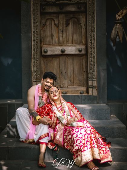 A sweet, candid moment between the bride and groom on the steps after their ceremony. These are the quiet, in-between moments that truly define the wedding day.