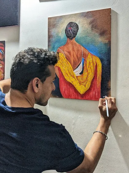 Adding the final touches to a canvas painting. This moment is about refining the details that bring the entire artwork together. It’s a satisfying part of the process that we work towards in my classes.