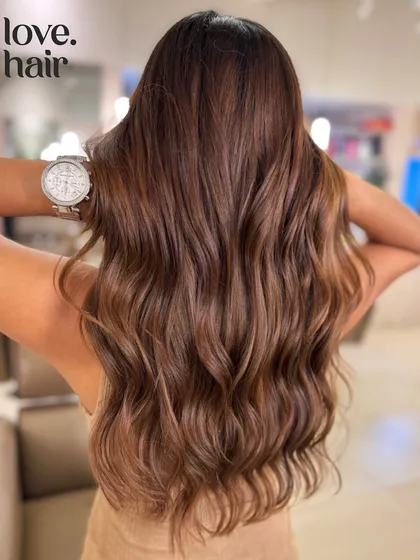 Gooey, chocolatey Nutella hair. This global color is a rich, solid hazelnut brown that looks good enough to eat.