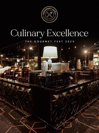 "Culinary Excellence, The Gourmet Fest 2023." A wide shot of our expansive and stylish buffet setup at this prestigious food festival, showcasing our capacity for large-scale, high-profile events.