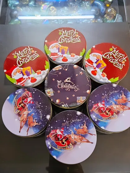 My Christmas edition chocolate tins, featuring various Santa and reindeer designs.