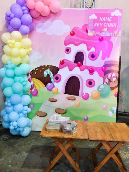 A "Name Key Chain" activity station where kids can create their own personalized party favors.