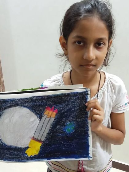 Unnati from 3rd standard drew her own 'Mission Moon' picture with oil pastels. Her artwork shows a rocket approaching the moon, inspired by the Chandrayaan-3 success.