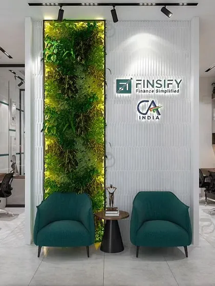 A conceptual render for a modern CA firm, designed to break away from dull office themes. We introduced a central green wall and a vibrant, quirky color palette to create an energetic and welcoming workspace.