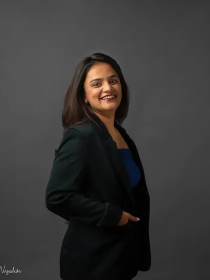 This portrait combines a professional blazer with a softer, more relaxed expression. It’s a versatile look that works well for both corporate websites and social media profiles like LinkedIn.