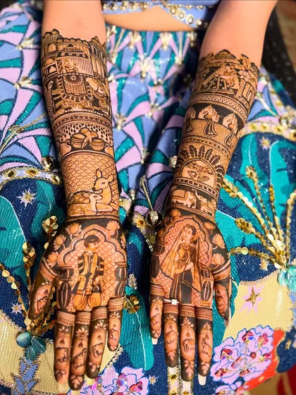 A close-up of a full bridal mehendi design, showcasing the incredible detail that goes into my work. This piece features classic bride and groom figures, a doli (palanquin), and even a deer, telling a complete wedding story on the arms.