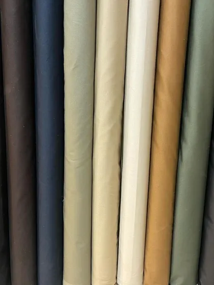 My collection of solid-colored fabrics in 100% silk cotton, available in a range of classic and contemporary shades for your custom suit or formal trousers.