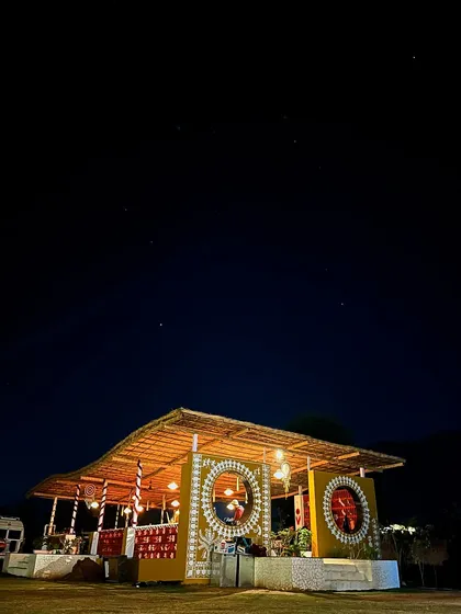 A night shot of the Warli art hut. The artwork looks just as stunning under the stars, creating a magical ambiance for the outdoor space.