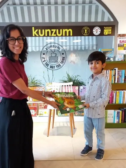 A big congratulations to this dinosaur fan for completing his summer quest! He was thrilled to receive a book about dinosaurs as his final prize.