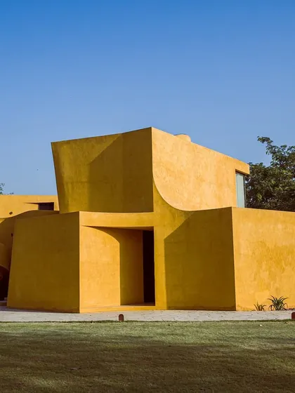 I designed Anvaya's architecture to be in conversation with nature. The sun-soaked ochre walls and organic curves create a sense of being both grounded and free, a structure rooted in design and wrapped in the wild.