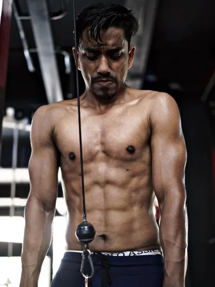 The "after" shot of a 12-week fat-to-ripped journey. The focus and intensity in this shot reflect the hard work that went into his transformation.