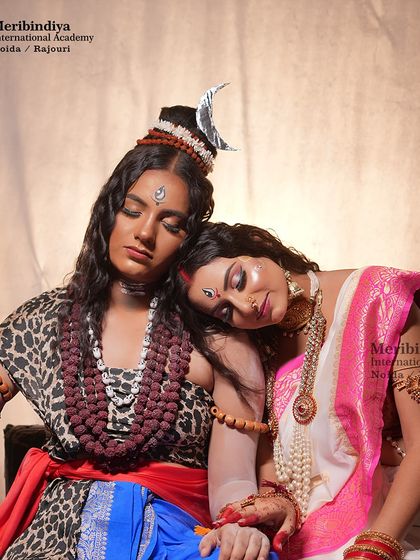 A serene and peaceful pose, where the makeup helps convey the calm and powerful energy of the deities.