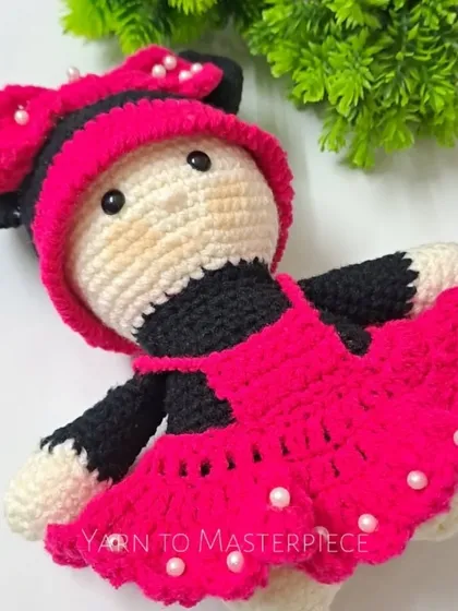 My take on the classic Minnie Mouse character. This doll features her signature bow with pearl details, a pink dress, and a sweet expression.