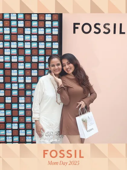 A warm moment between mother and daughter at the Fossil Mother's Day event. These are the authentic interactions that make a brand event feel personal and memorable.