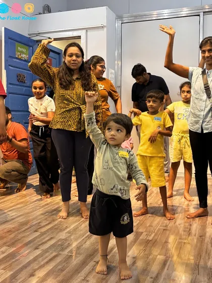 A group of kids and adults learning a fun dance routine together. Our studio events are designed to be inclusive for all ages.