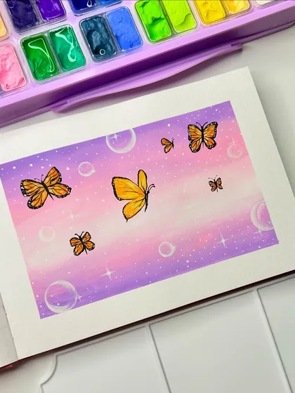 Another shot of the butterfly and bubble painting, showing the full scene with my gouache palette nearby.