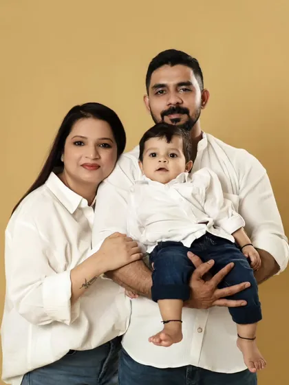 A formal family portrait where everyone is looking at the camera. We make sure to get these classic shots that are perfect for sharing with family and friends.