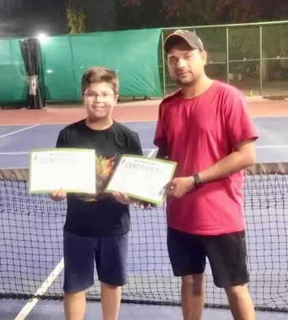 Our player Viraaj Sharma with his coach after securing 3rd place in the Under-12 Boys Singles at the Ad in Tennis open. This was his first tournament with us, and he also won the 'most promising player' award.