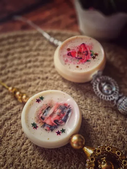Two of my wardrobe fresheners, showcasing the beautiful latkan accents. These dangling details elevate the overall look, making the fresheners not just functional but also visually stunning.