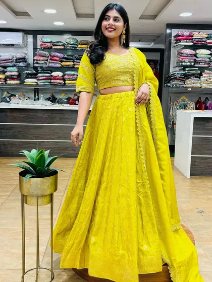 Starting Navratri with this bright yellow lehenga. The simple yet elegant design with subtle work makes it a perfect outfit for day one's celebrations.