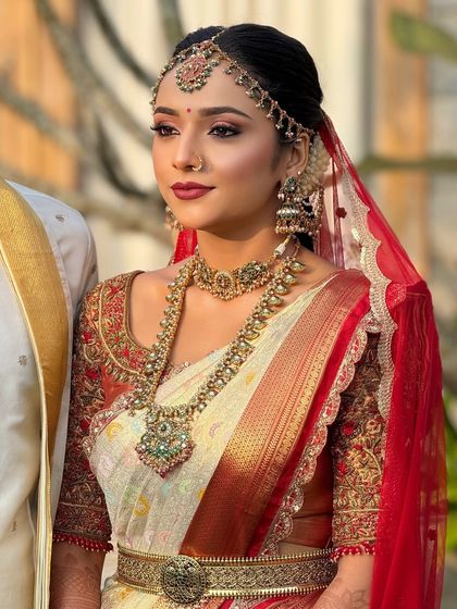 A close-up of the bride's radiant makeup. The look is fresh and dewy, perfect for a daytime wedding ceremony, and designed to last all day.